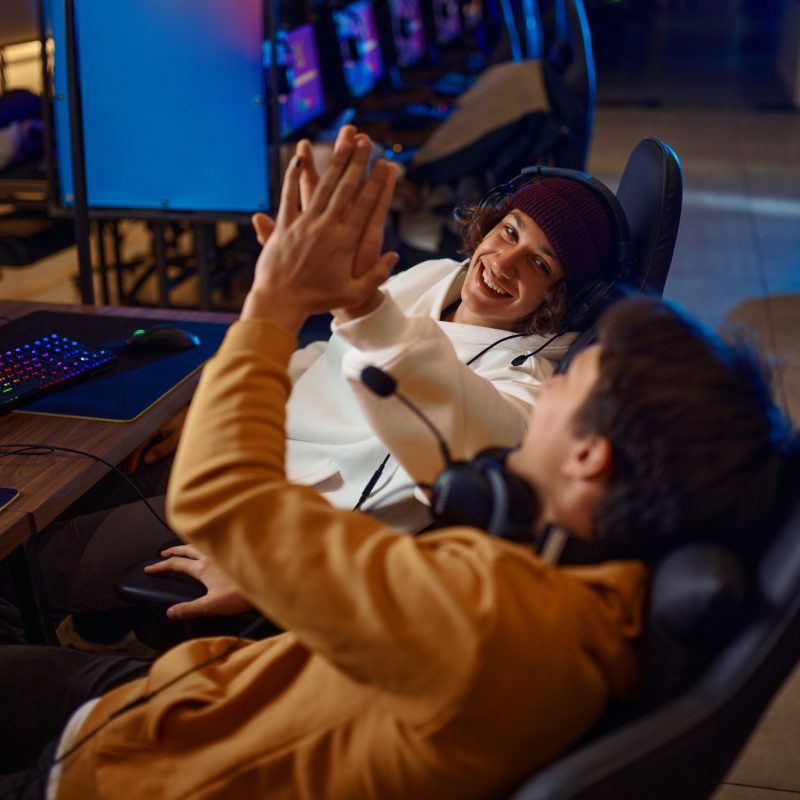 two-young-gamers-having-fun-in-game-club.jpg